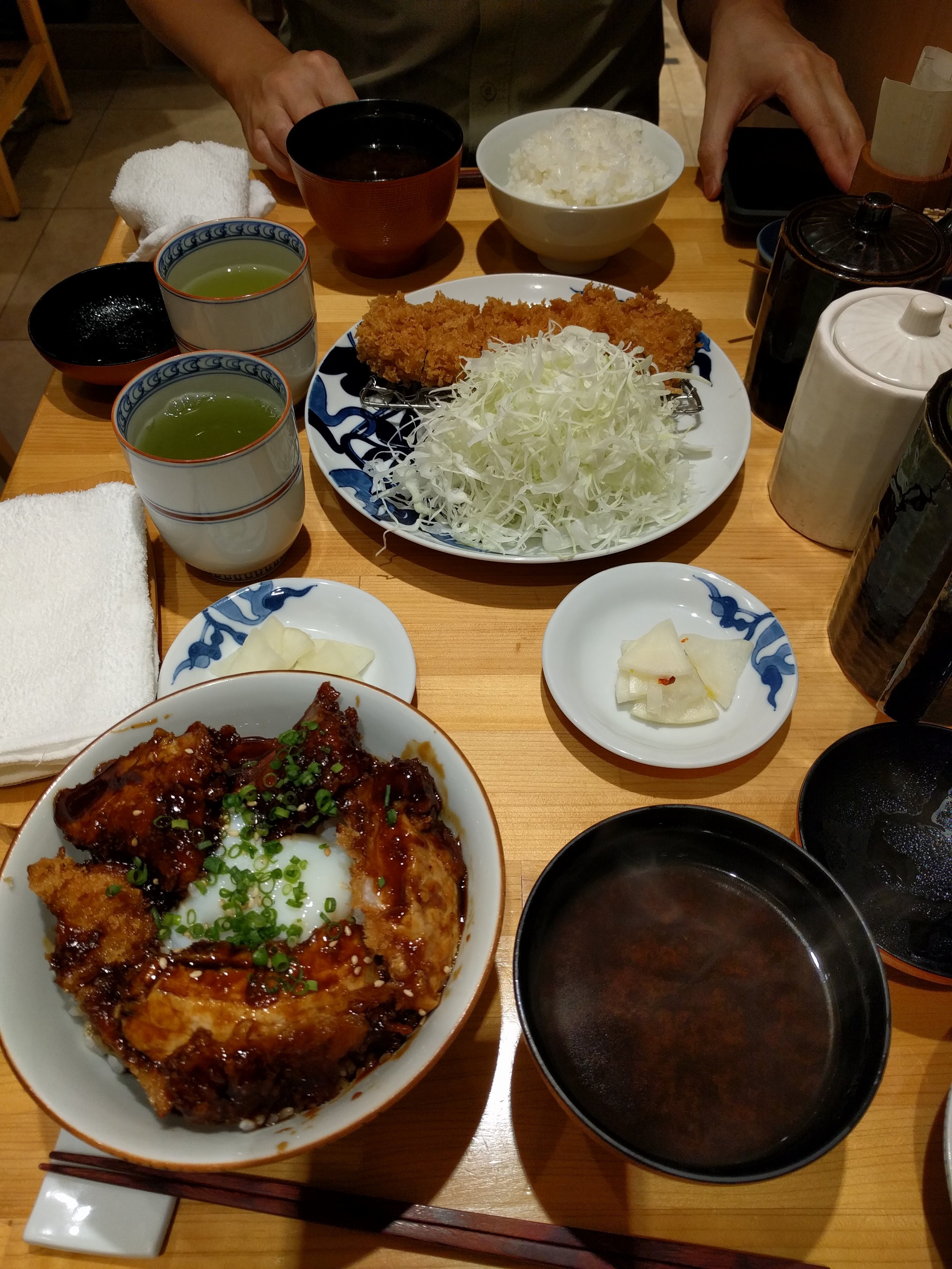 <p>Tonkatsu Suzuki at Tokyo Station Kitchen street. We ate this meal in less than 10 minutes because we had a train to catch, but it was delicious. Super crispy tonkatsu, flavorful, and the miso soup had little clams in it that upped the flavor (and it was made with red miso).</p>