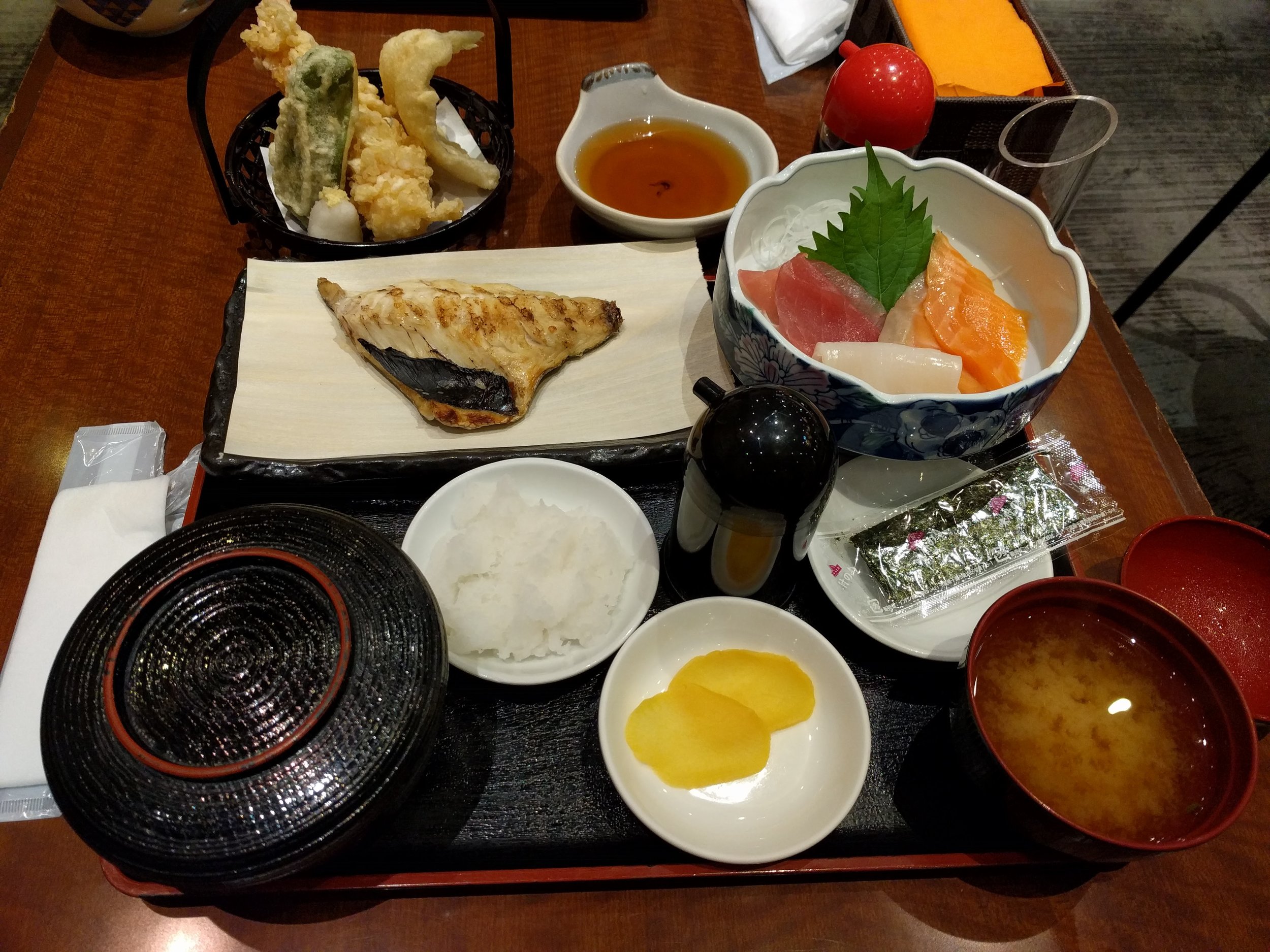 <p>So when we ordered this, the waitress said a bunch of Japanese which she couldn't translate, which we decided she thought we ordered too much food. Oh well! We ate it all. The shrimp tempura was phenomenal, sashimi was solid, broiled fish was a bit overcooked.</p>