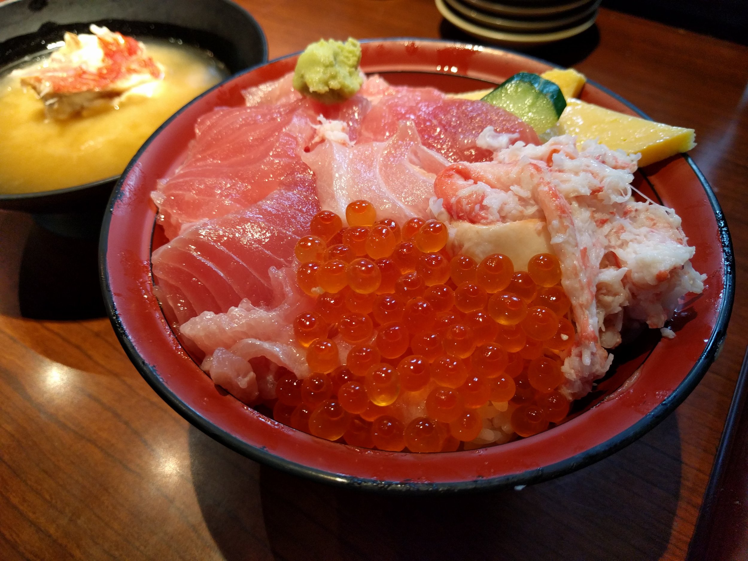 <p>Omi-cho market in Kanazawa - random sushi place. We had high hopes for Omi-cho, but this sushi didn't exactly hit those high notes.&nbsp;We did sit at the bar in a tiny 4 seater restaurant which was cool, though the sushi chef probably died a bit watching us share sushi pieces (not pictured sushi plate).</p>
