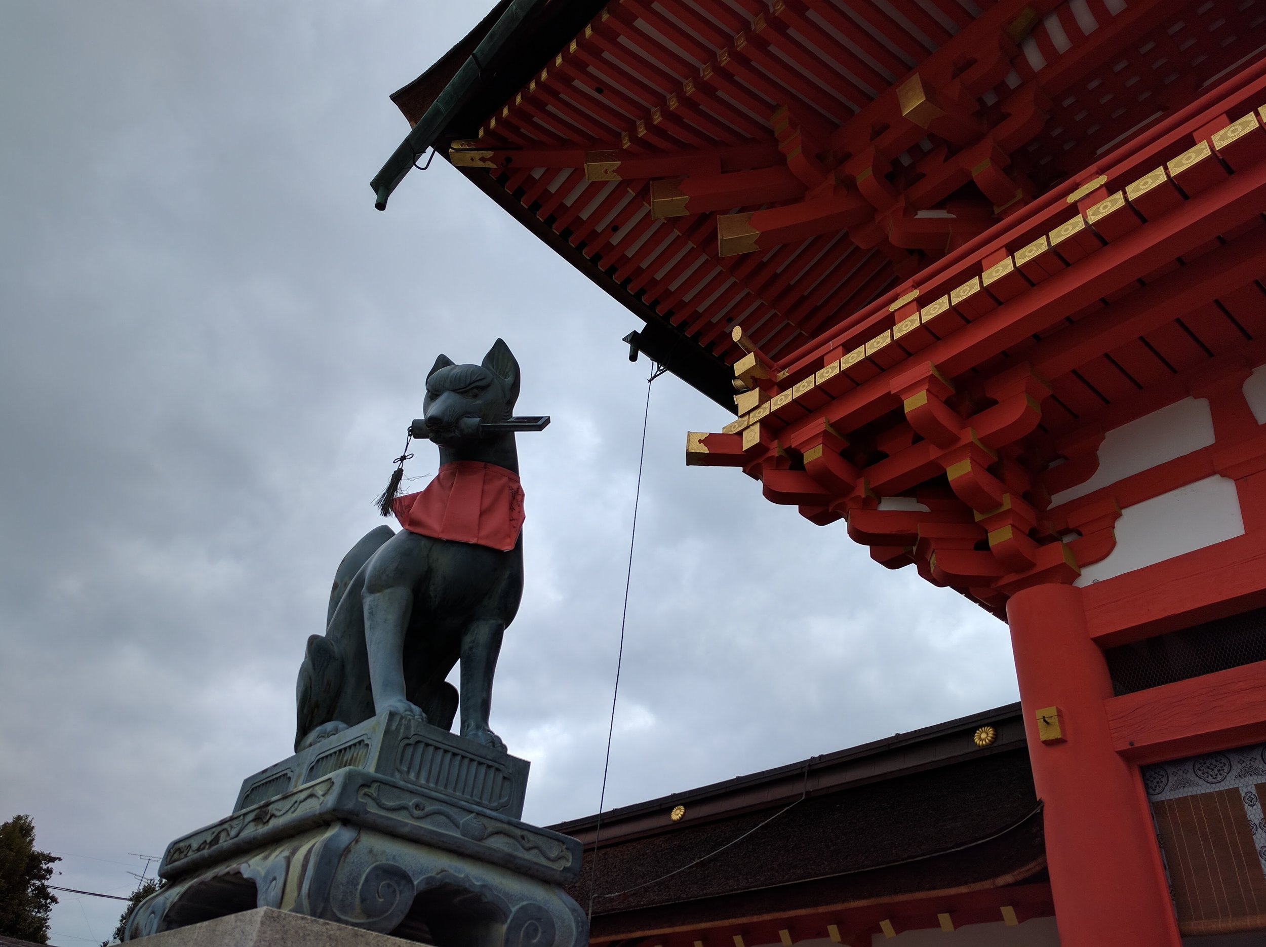 Lots of foxes guarding the shrine