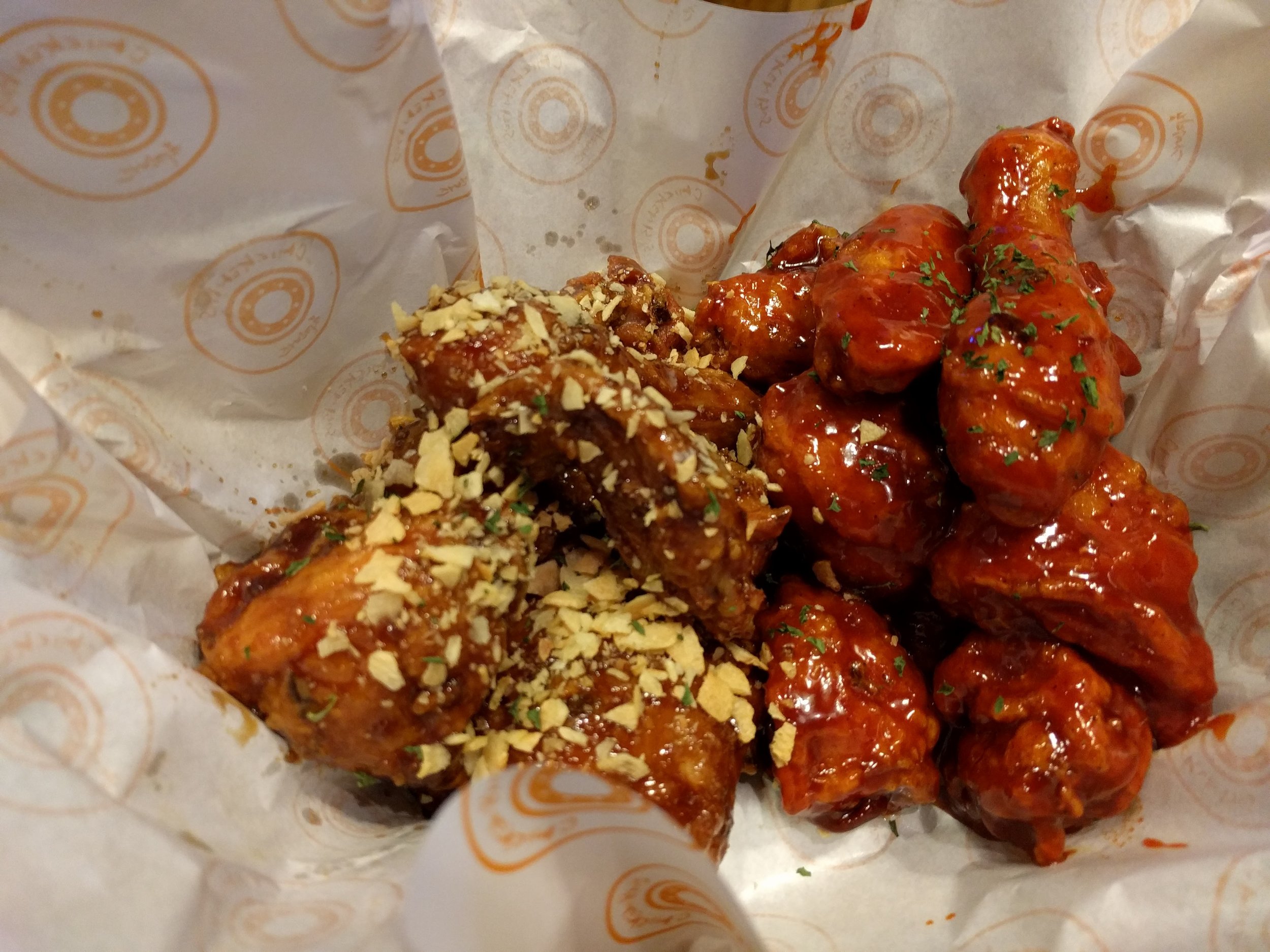 <p>Our first Airbnb in Seoul was above a strip of chicken joints so we had to try it out! Black garlic and spicy sauces... Eric loved the fried garlic chips!</p>