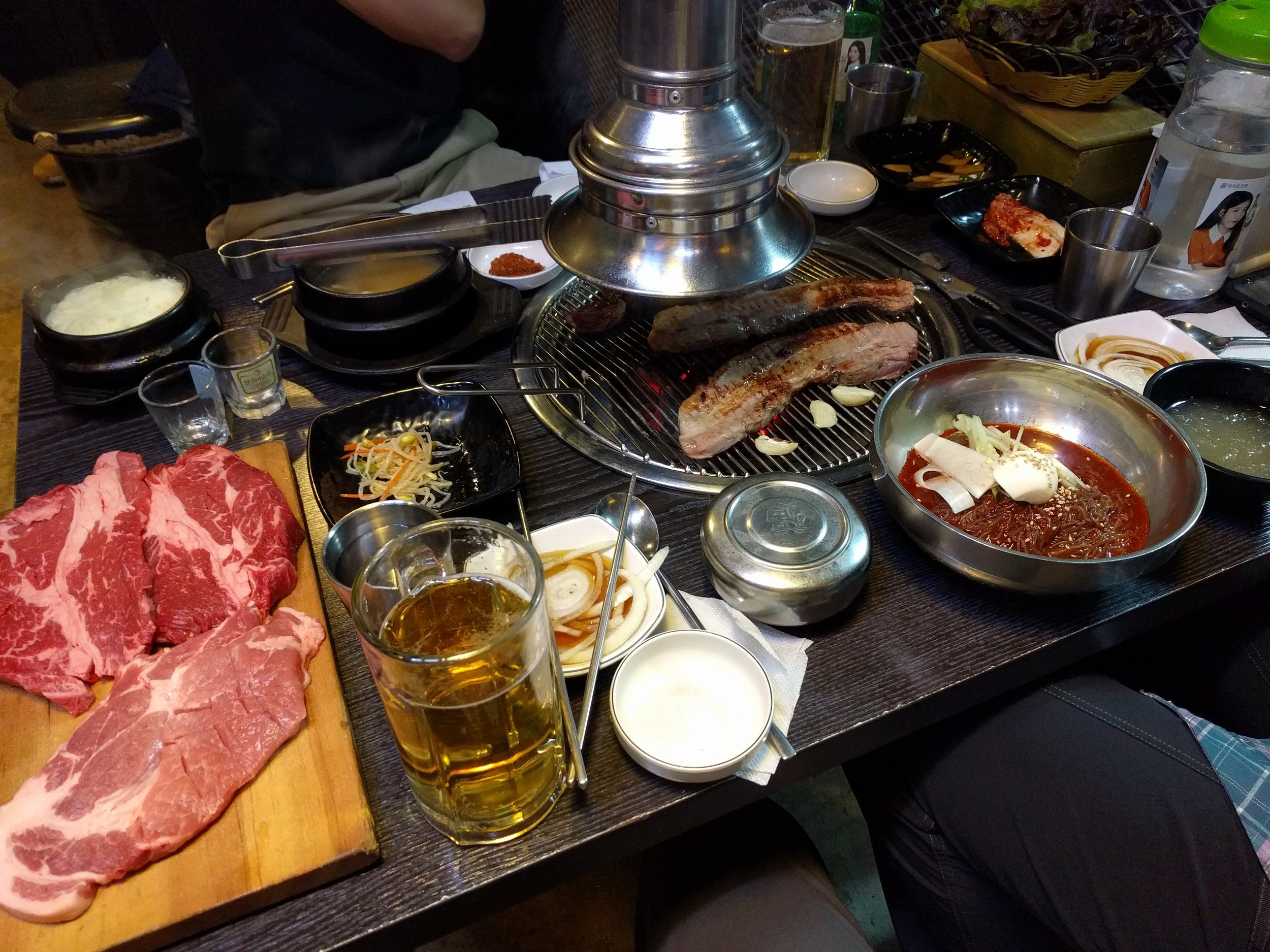 <p>Korean BBQ with Eric's friend Jason. All you can eat (within a time limit) and serve yourself bar for lettuce and banchan. The cuts of meat were surprisingly good, since I feel like all you can eat kbbq in the states generally has lesser quality meats</p>