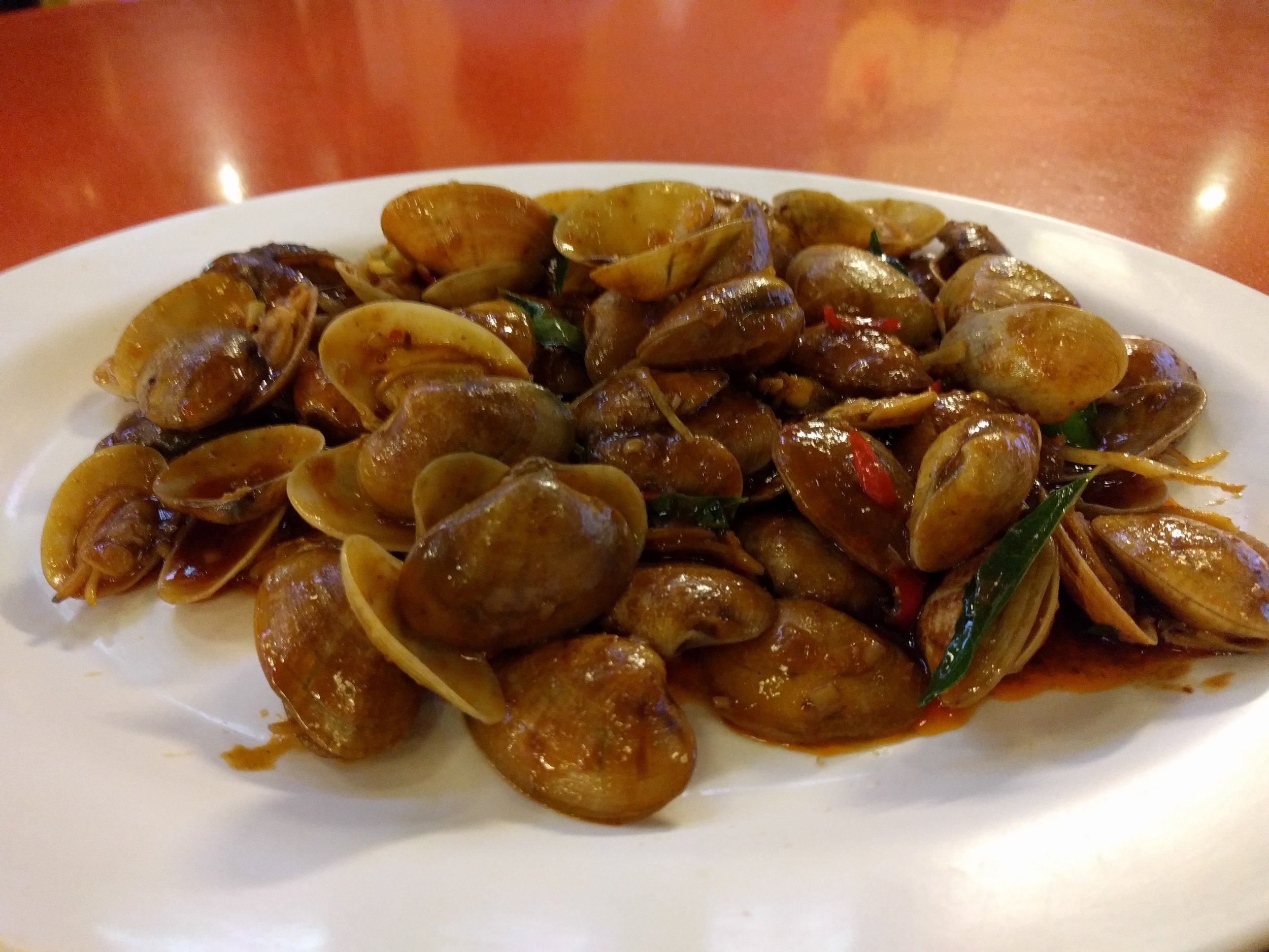 <p>Funny story - we thought like 1/4 of the clams were dead (not opening) but the waitress got gloves and popped all of the closed ones open since they were so fresh and had just gotten sealed shut during cooking. what noobs!</p>