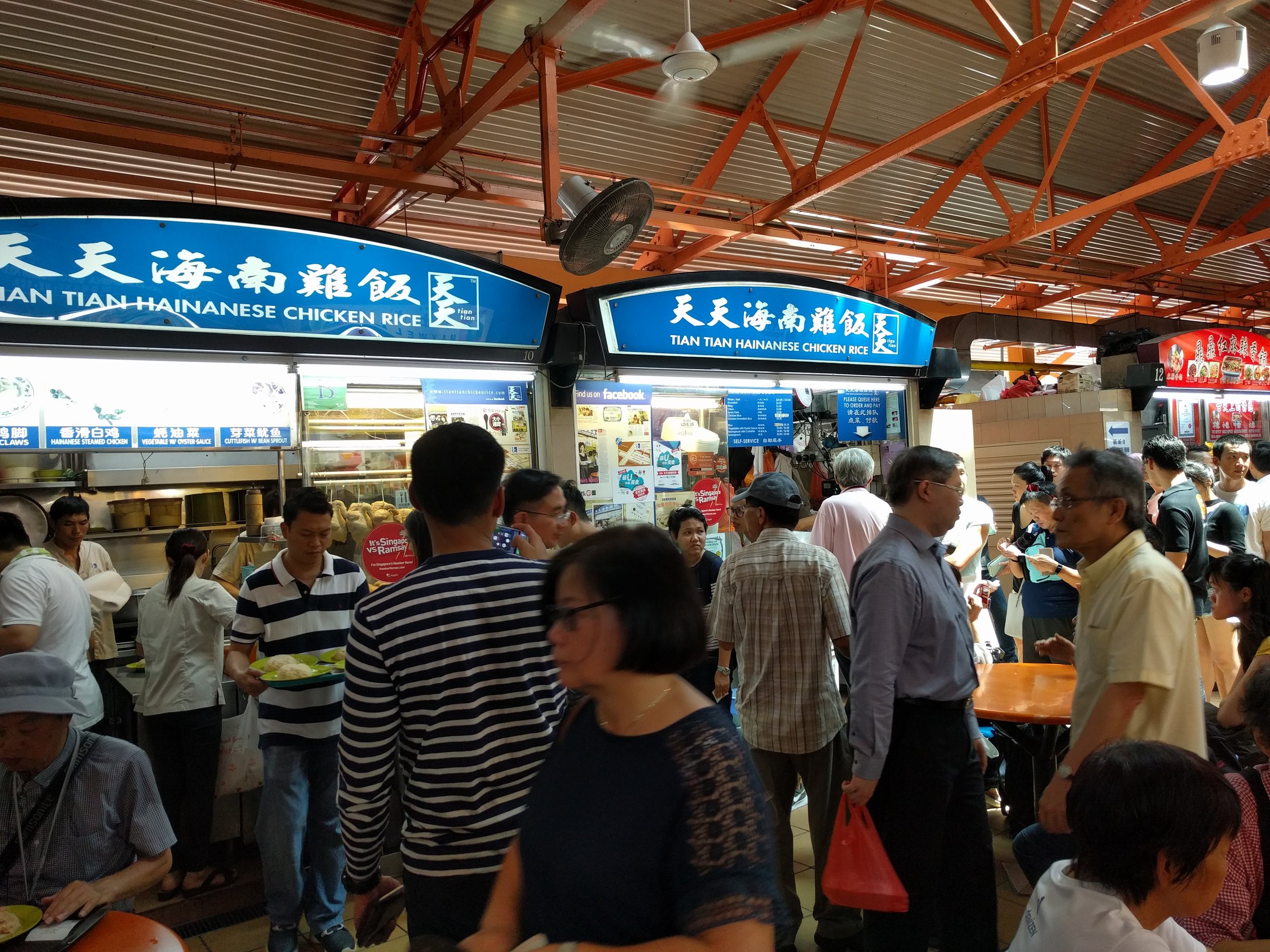 <p>Tian tian chicken and rice (hainanese style) is popular due to Anthony Bourdain visiting. We didn't wait in this line...</p>