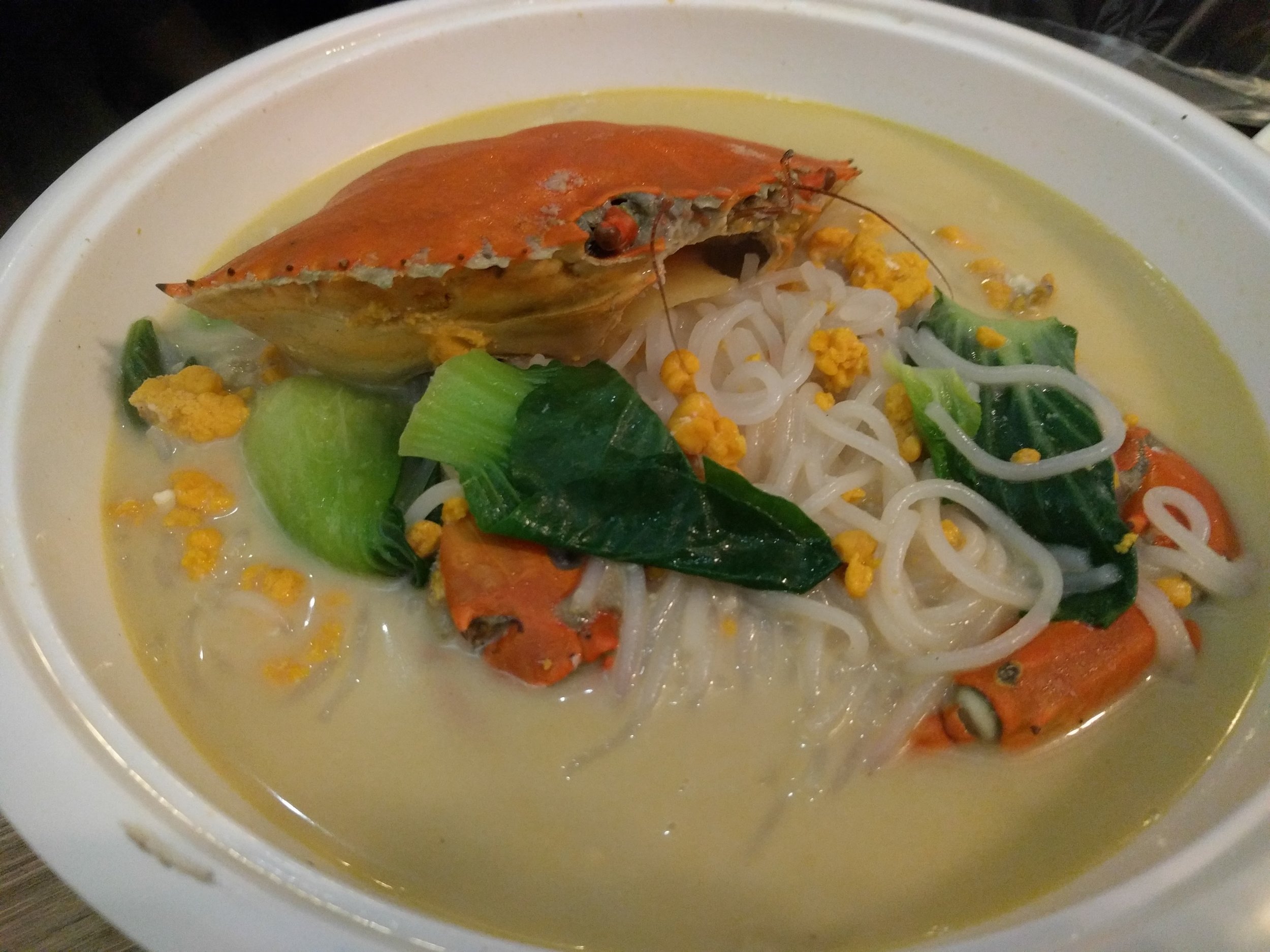 <p>Milky rich broth with the crab roe and noodles</p>