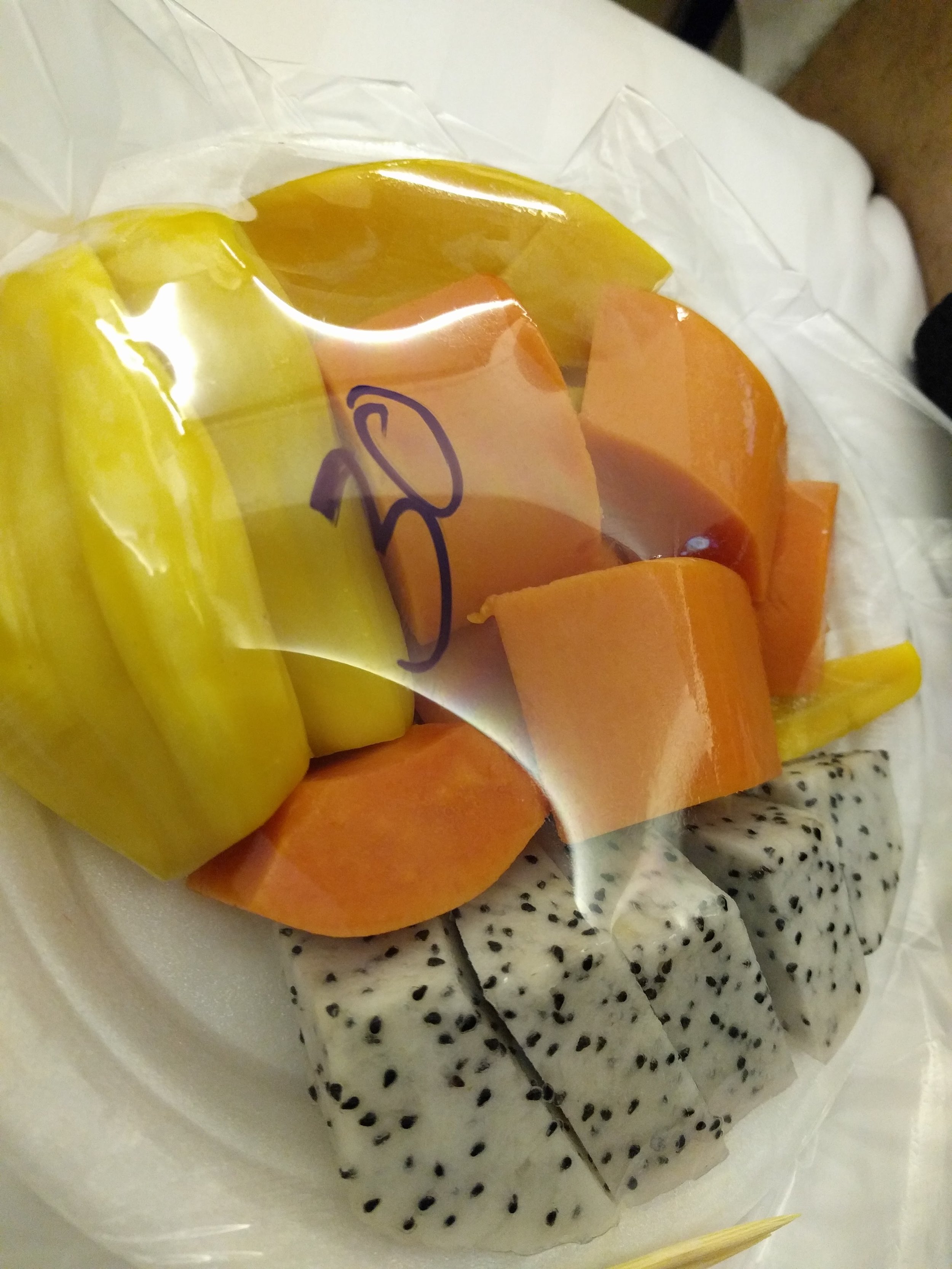 Mixed fruit plate: jackfruit, papaya and dragonfruit