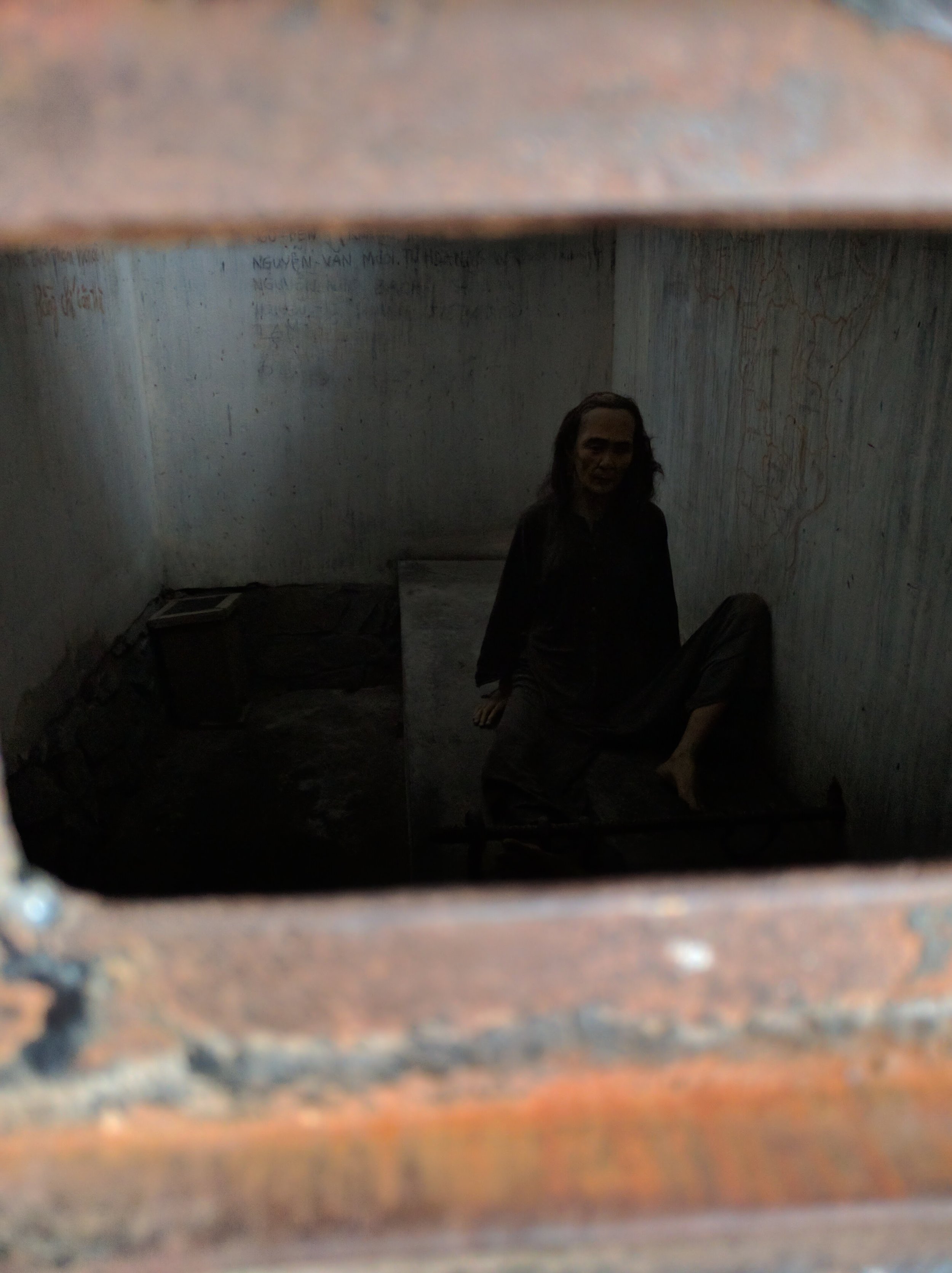 Creepy wax statues inside the prison cell