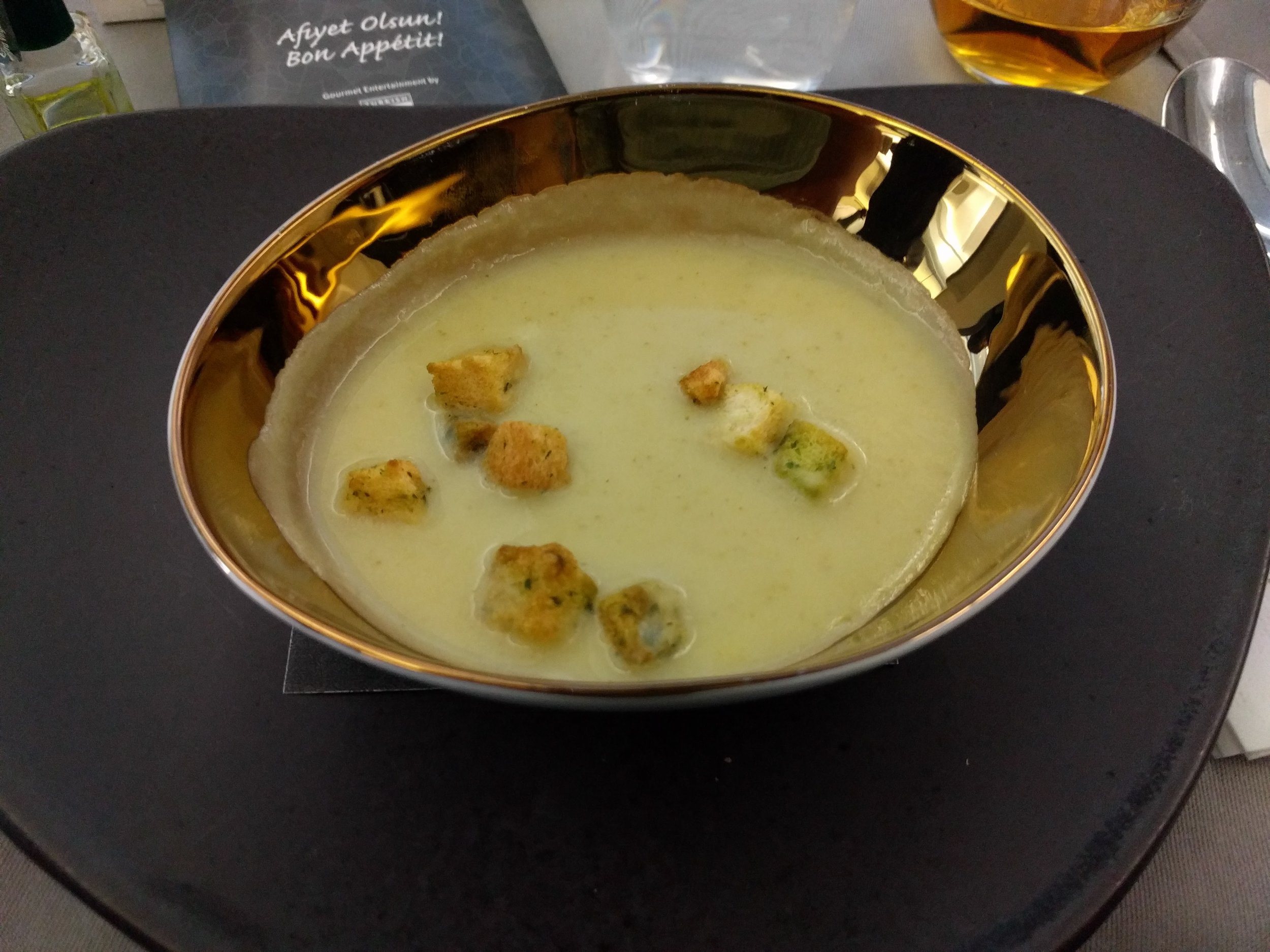 Zucchini soup (I think?) with croutons