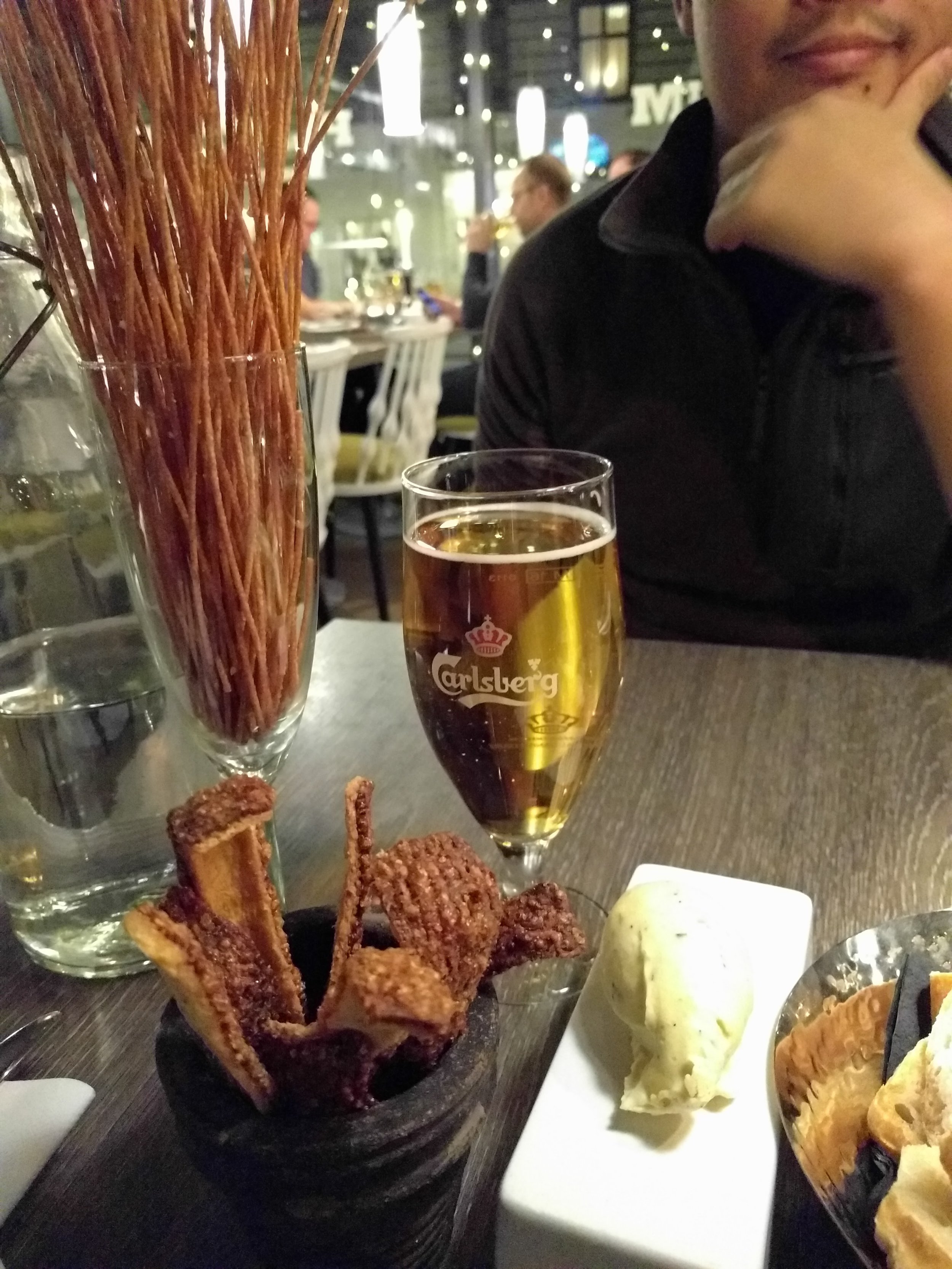 <p>Fried spaghetti and the worst pork crackling ever. Eric really liked the Carlsberg though</p>