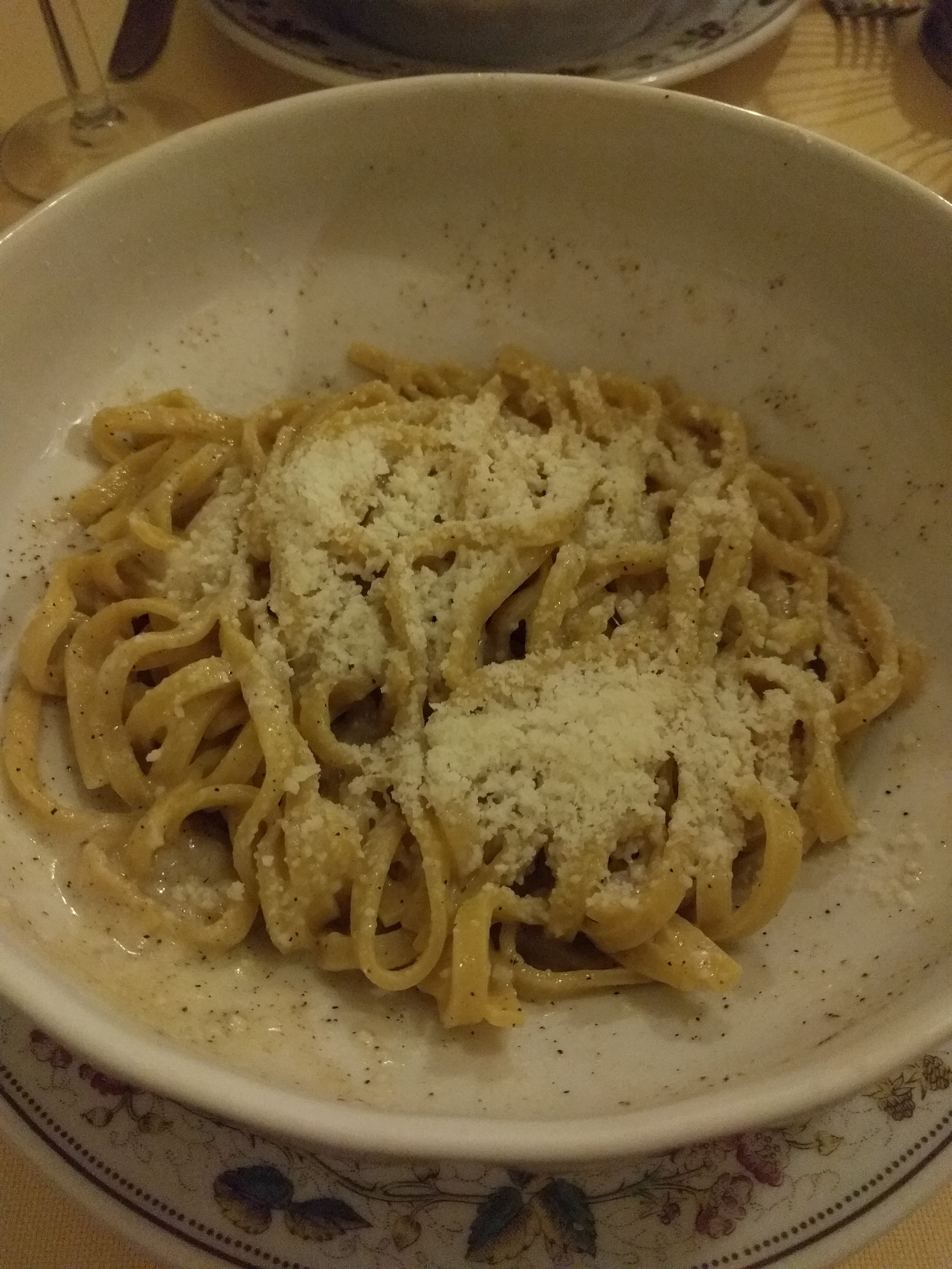 <p>Cacio e pepe is a common Roman pasta of just cheese and pepper. This was super peppery and made me think of black cracked pepper kettle chips in pasta form. Tasty but gets intense after a bit</p>