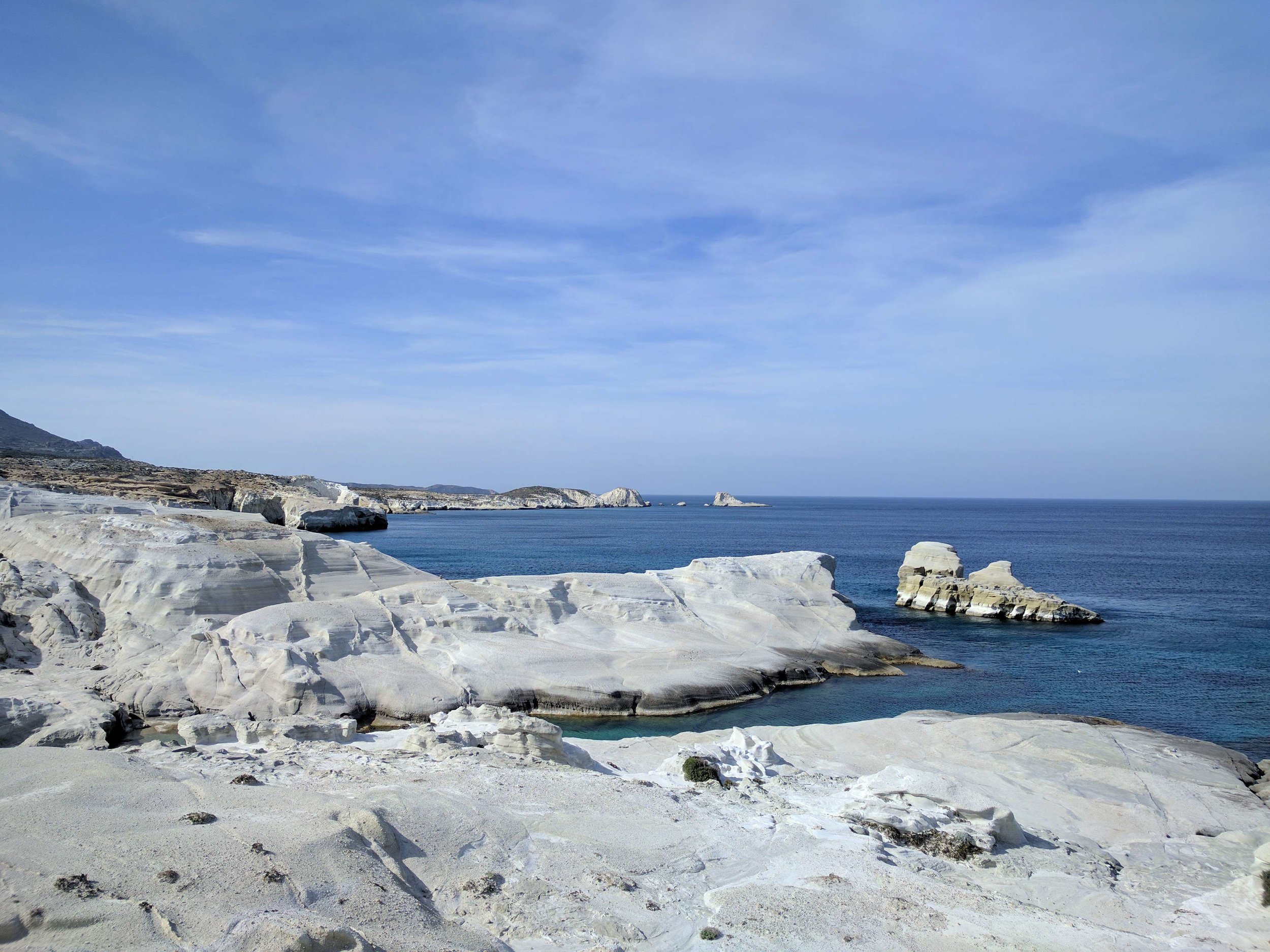 White rocks against blue Aegean sea