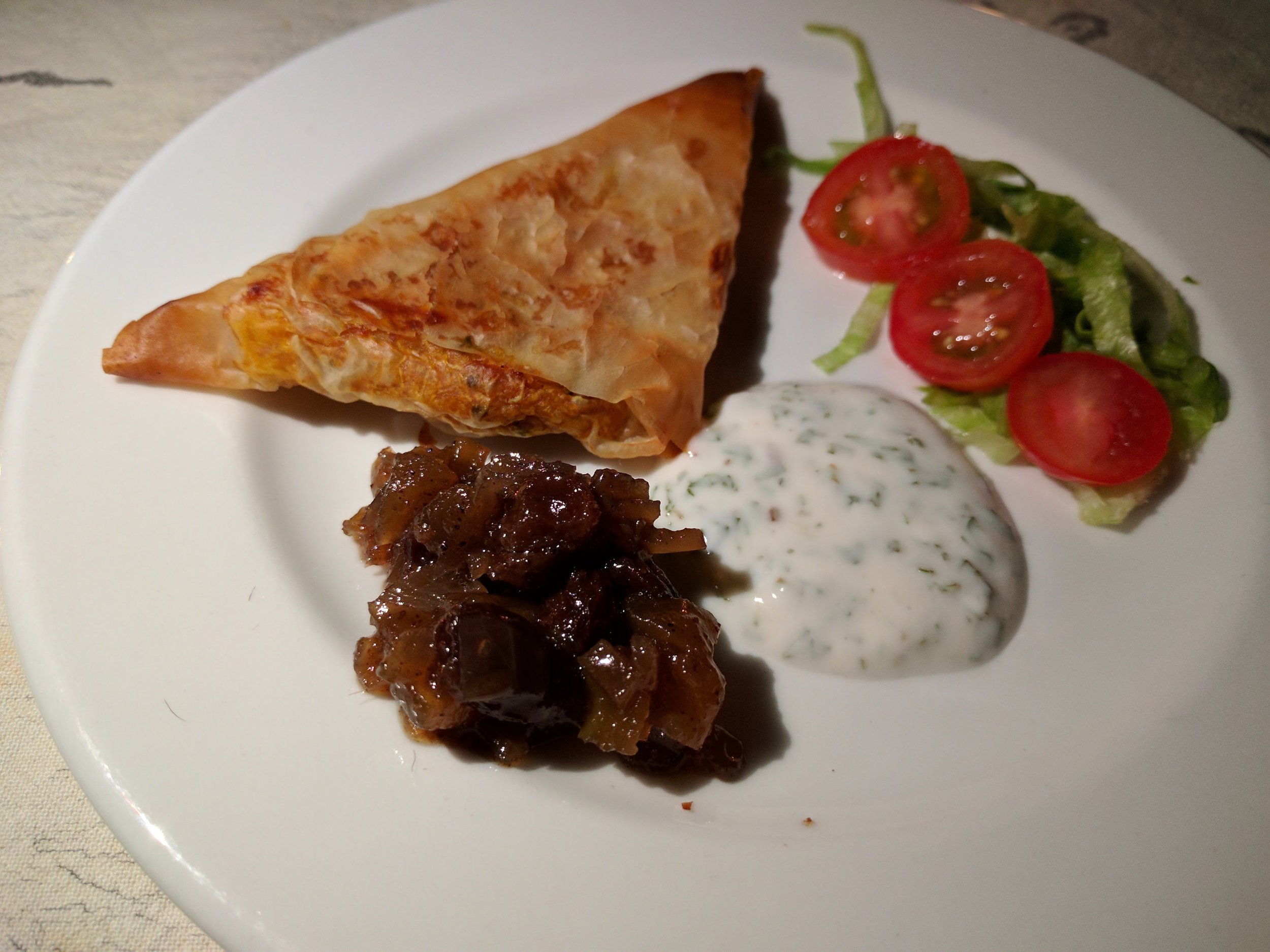 Appetizer - puff pastry, tzatziki sauce, compote