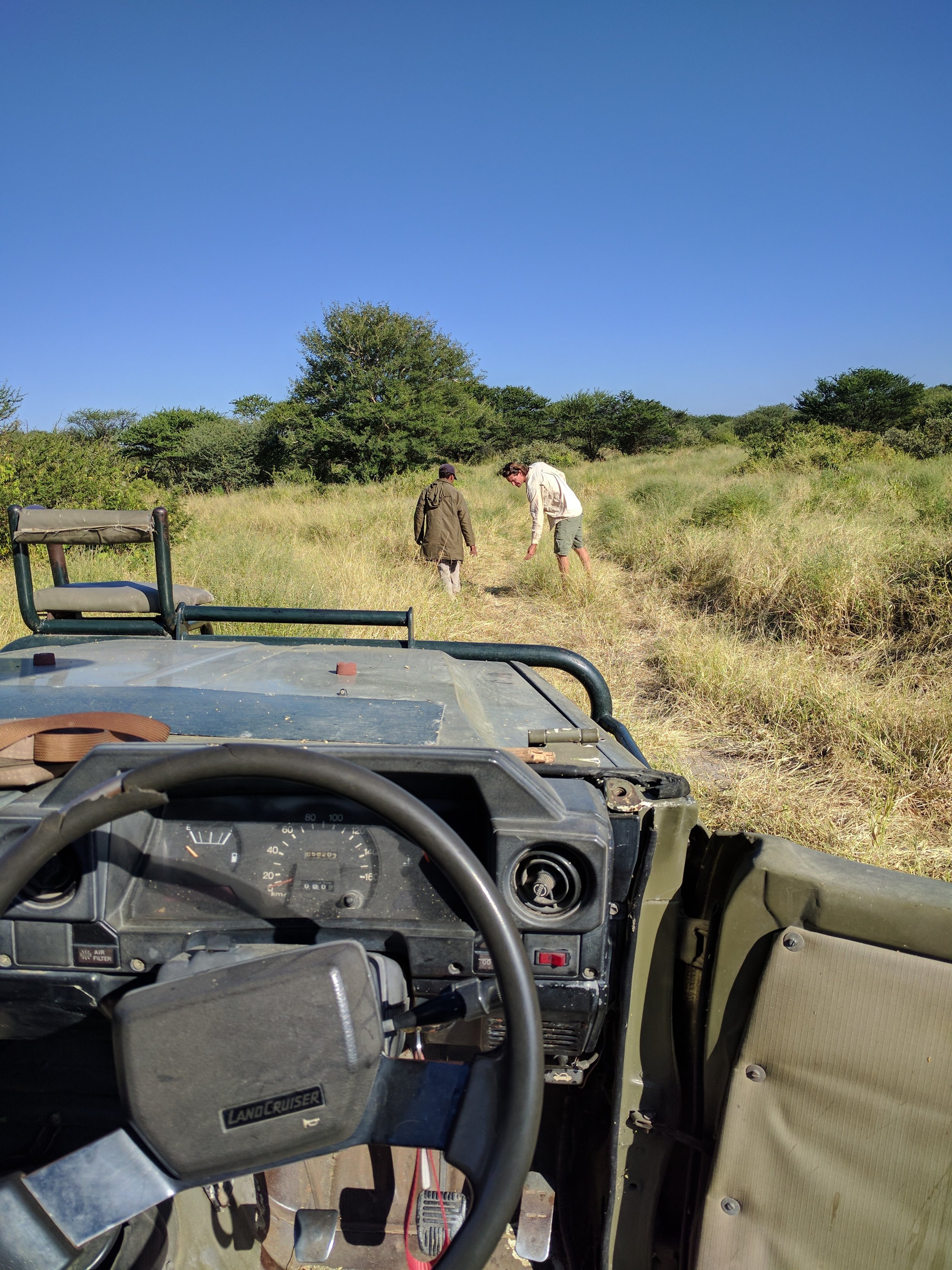 Guide and tracker trying to see where to go