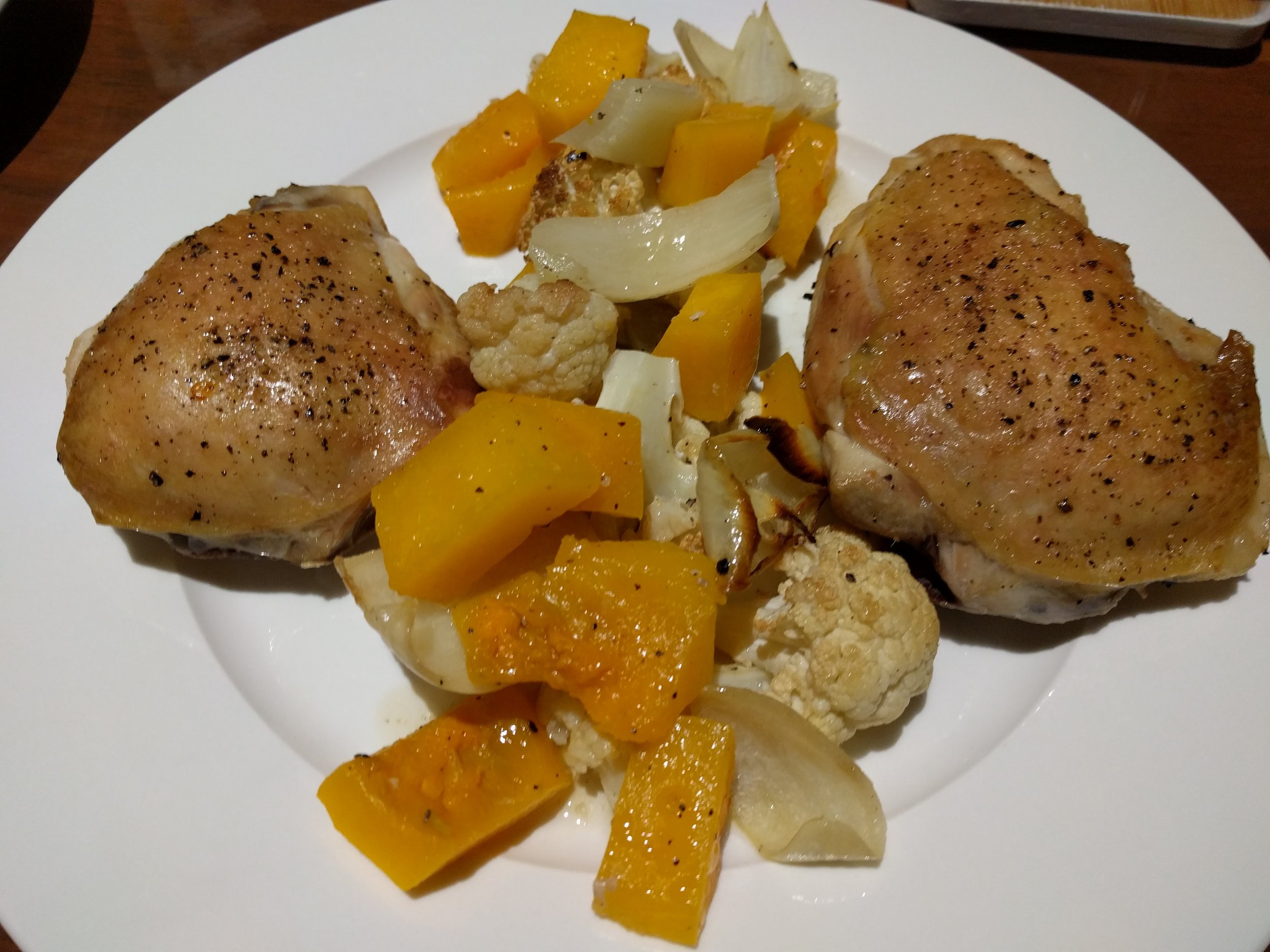 Roast chicken with pumpkin and cauliflower